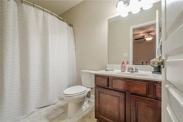 a view of a chair and tables in the patio