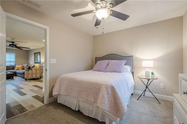 a view of a yard with a house and a tree