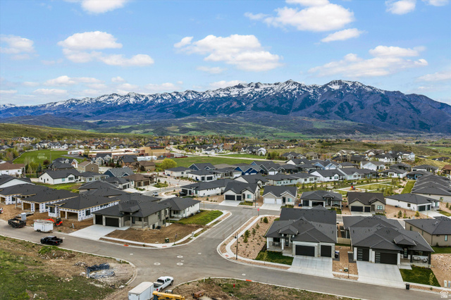 3349 Oxford Loop Morgan, UT 84050 - Photo 46 of 47 Aerial view of residential area with a mountainous background