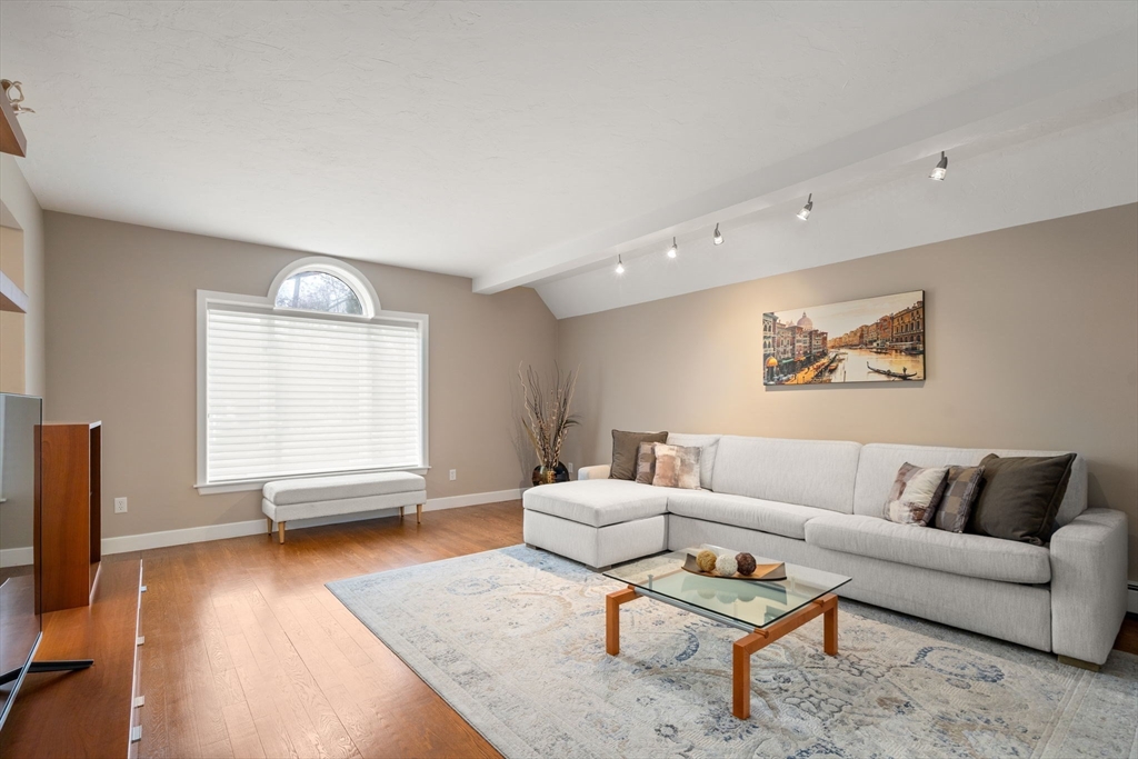 13 Lyndon Road Sharon, MA 02067 - Photo 13 of 29 a living room with furniture and a flat screen tv