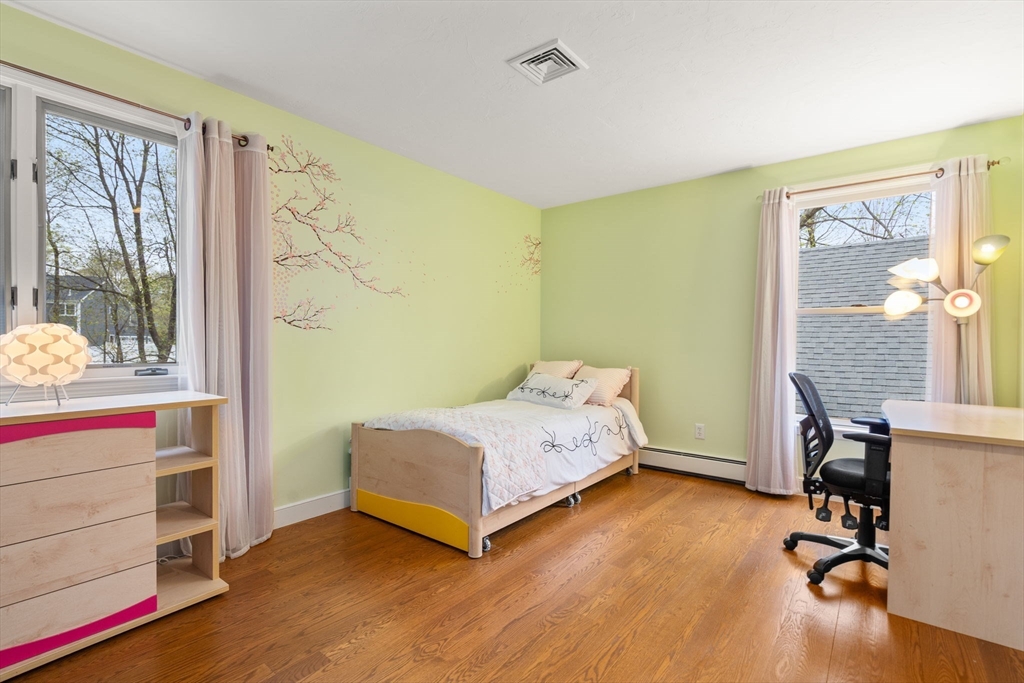 13 Lyndon Road Sharon, MA 02067 - Photo 26 of 29 a bedroom with a bed and a window