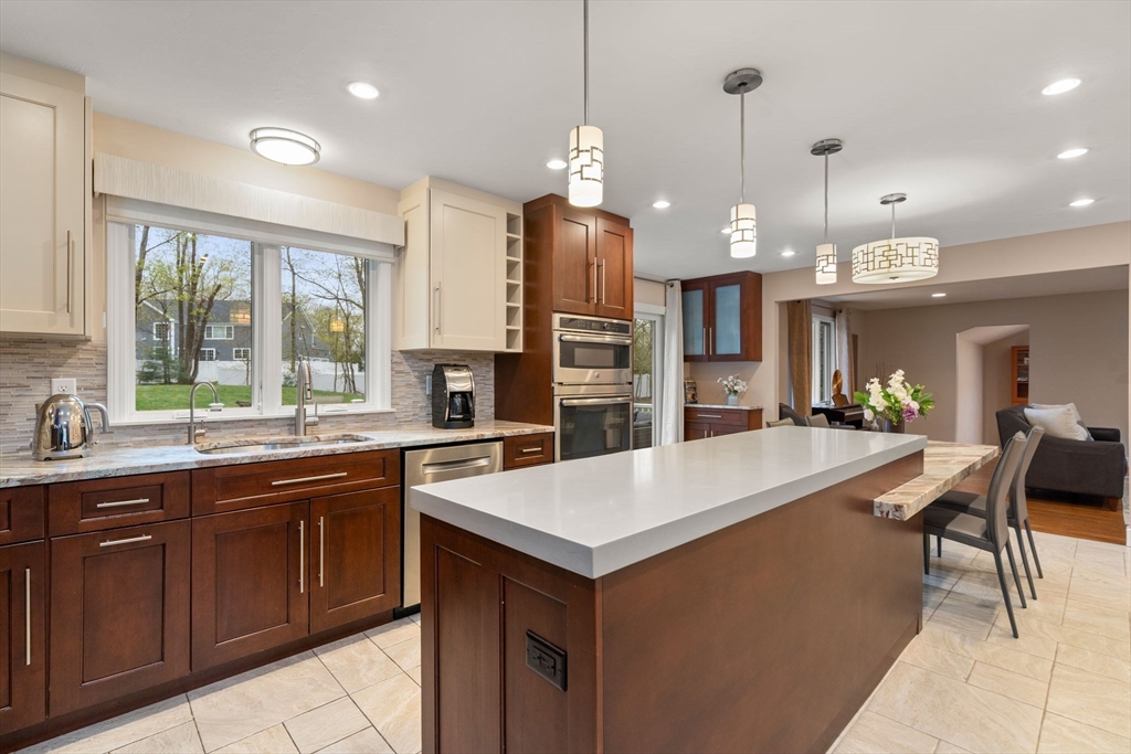 13 Lyndon Road Sharon, MA 02067 - Photo 7 of 29 a large kitchen with lots of counter space and sink