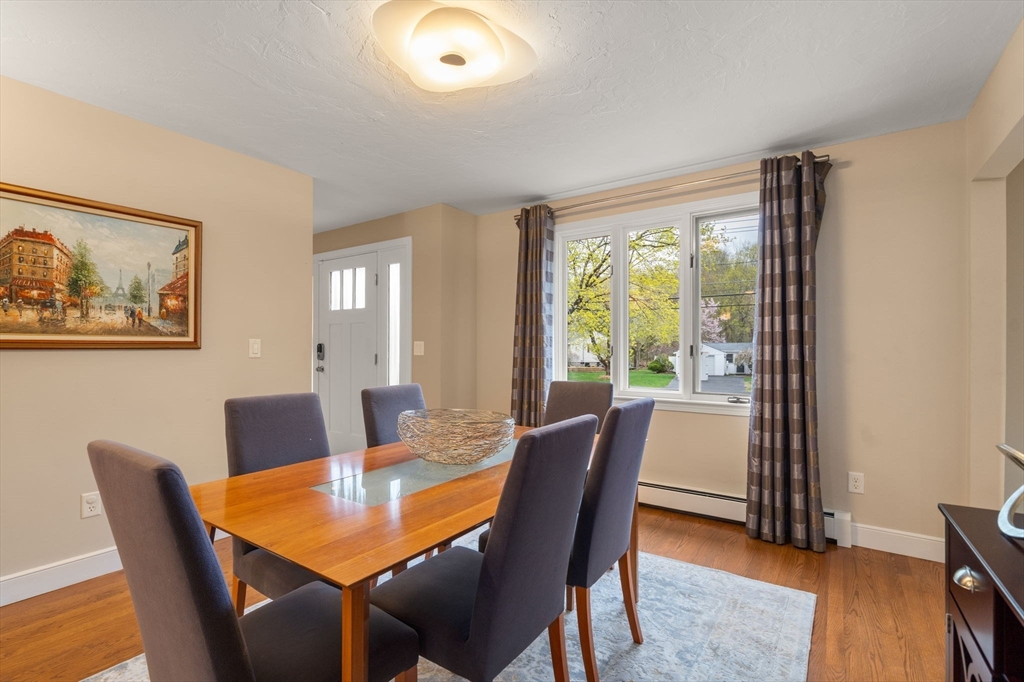 13 Lyndon Road Sharon, MA 02067 - Photo 10 of 29 a view of a dining room with furniture window and wooden floor