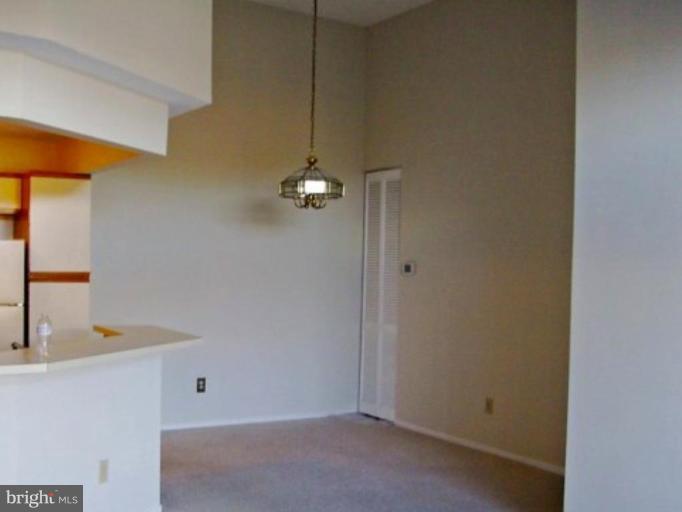 11703 Summerchase Circle, Unit E Reston, VA 20194 - Photo 2 of 6 a bathroom with a sink and shower