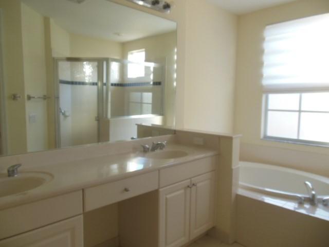 2726 Ravella Way Palm Beach Gardens, FL 33410 - Photo 14 of 28 Master Bath 1