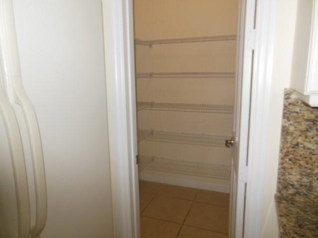 2726 Ravella Way Palm Beach Gardens, FL 33410 - Photo 5 of 28 Huge Walk-in Pantry
