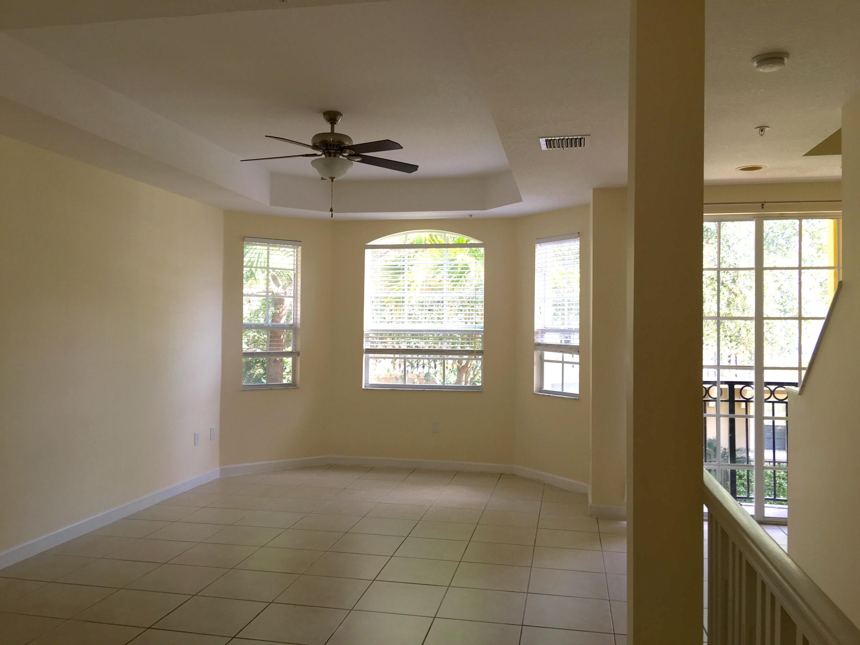 2726 Ravella Way Palm Beach Gardens, FL 33410 - Photo 9 of 28 Bright and open living area