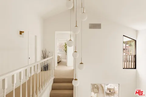 a view of hallway with stairs