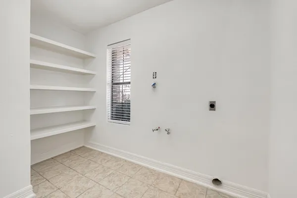 a view of a room with shelves