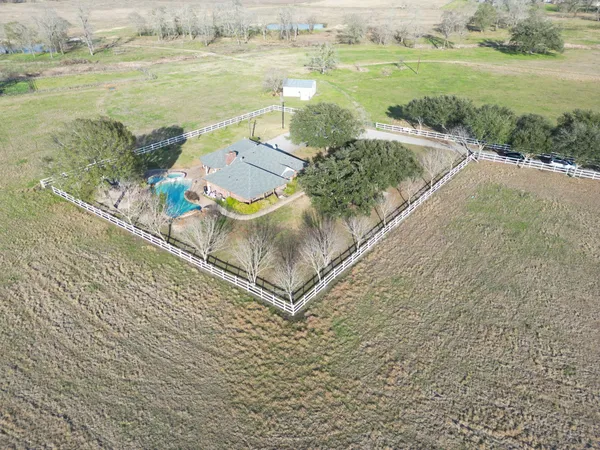 a view of a lake with a yard