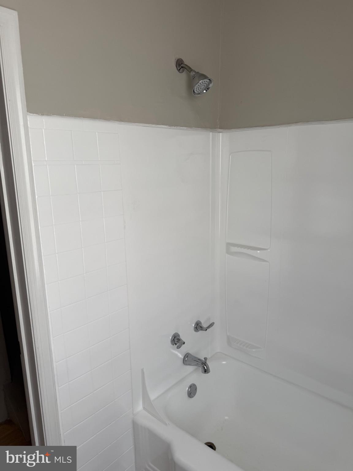 2803 Edison Highway, Unit 2 Baltimore, MD 21213 - Photo 11 of 11 a bathroom with a bathtub