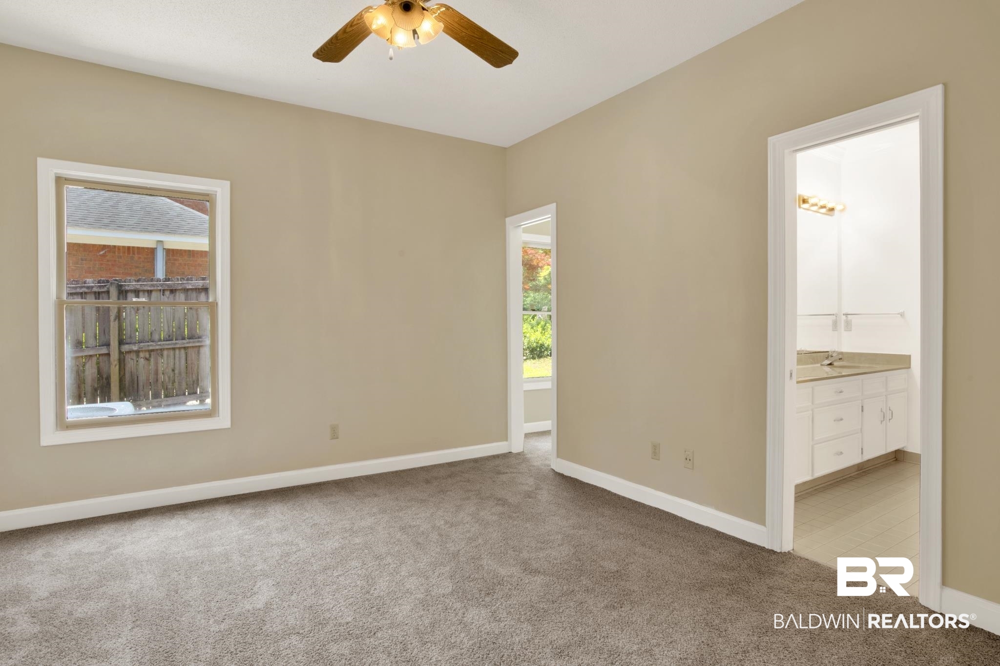 6805 Hunters Court Mobile, AL 36695 - Photo 25 of 37 Spare room with carpet floors, ceiling fan, and baseboards