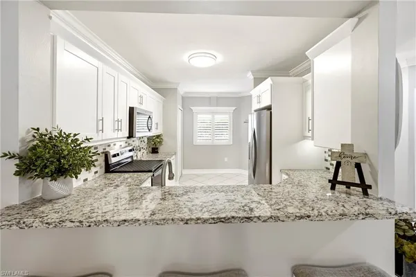 $269,900 | 7821 Great Heron Way, Unit 205, Naples, FL 34104