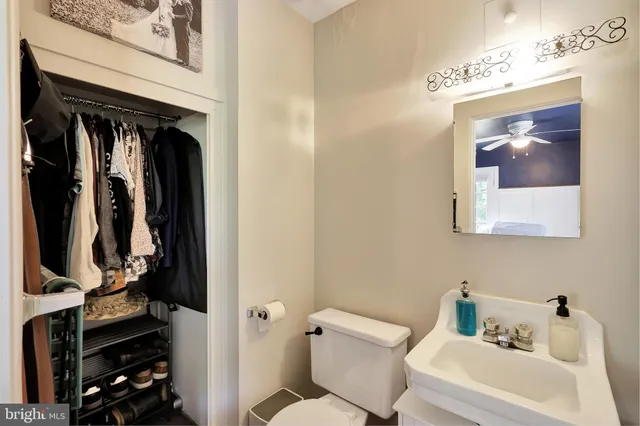 a bathroom with a toilet and a sink