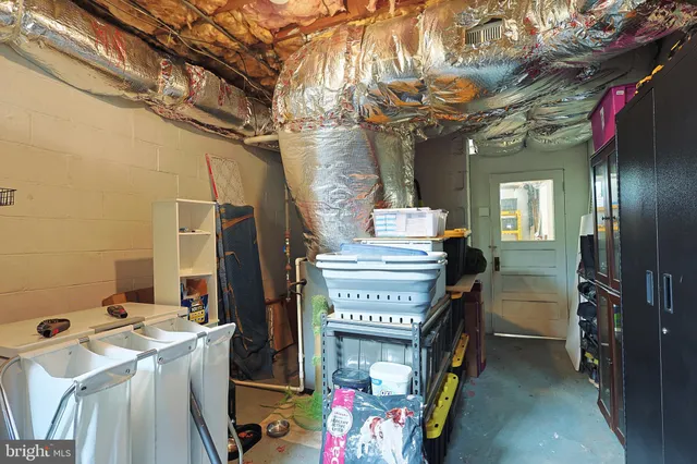 a storage room with washer and dryer
