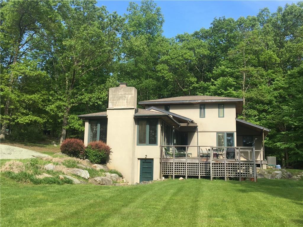 75 Eastwoods Road Pound Ridge, NY 10576 - Photo 1 of 1 Custom Contemporary on 3 spectacular acres offering privacy and 1.2 miles from Scotts Corners