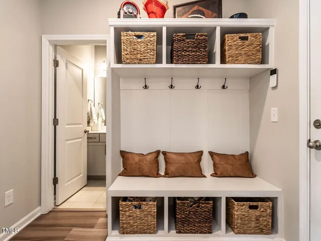 a picture of a bedroom with a bed and furniture