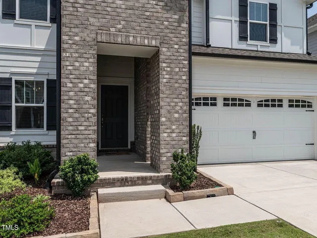 a picture of a counter top space with stainless steel appliances