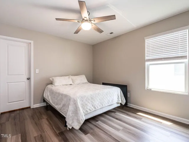 a view of a terrace with couches and pool