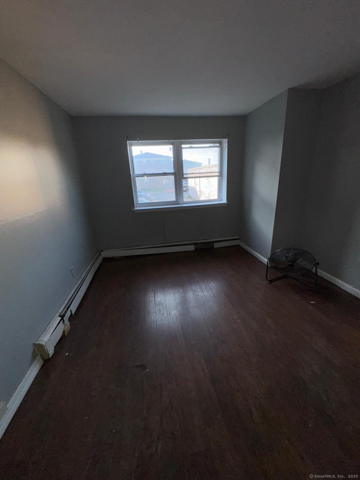 80 Taft Avenue, Unit 18 Bridgeport, CT 06606 - Photo 2 of 2 an empty room with a window