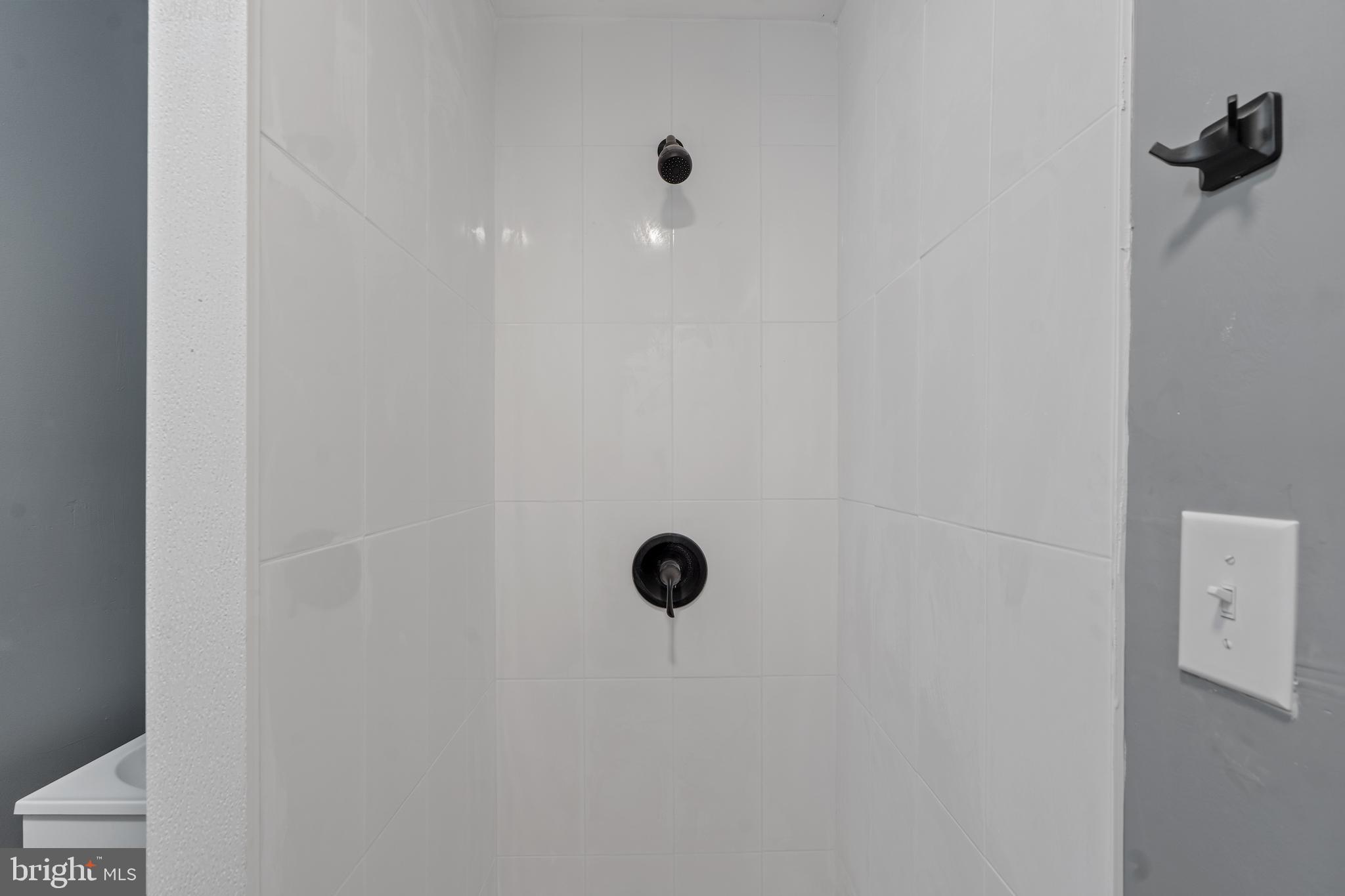 328 Jute Road Millville, NJ 08332 - Photo 13 of 28 a bathroom with a shower