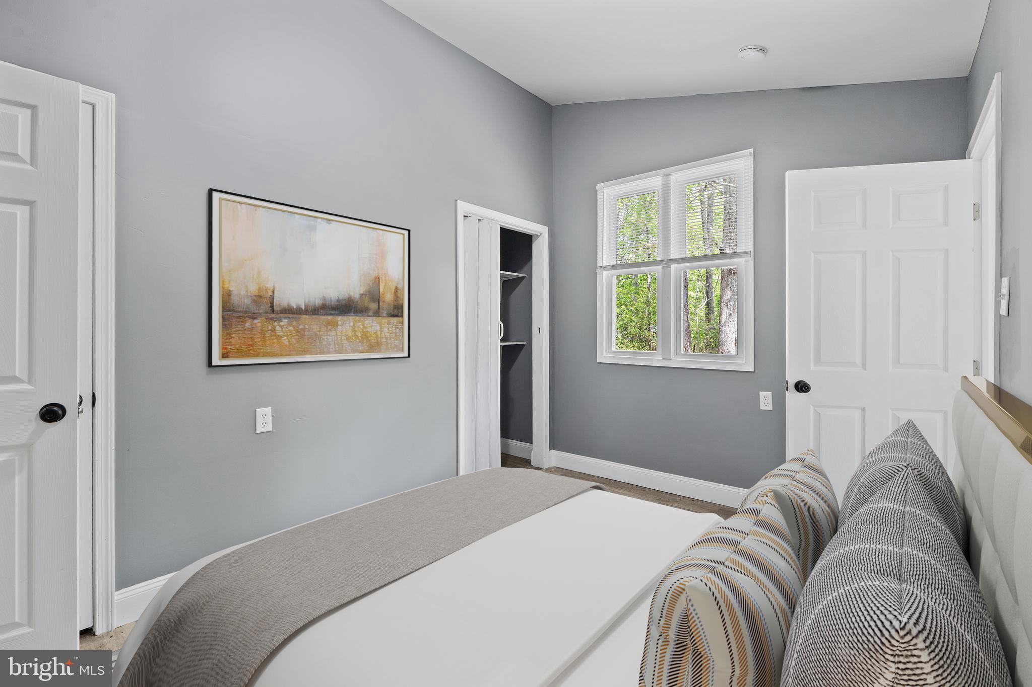 328 Jute Road Millville, NJ 08332 - Photo 16 of 28 a bedroom with a bed and a window