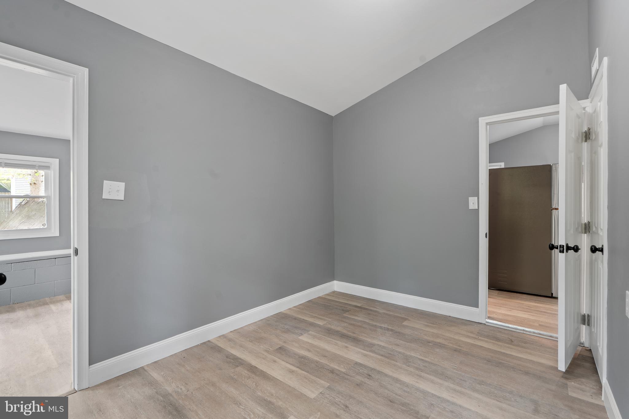 328 Jute Road Millville, NJ 08332 - Photo 17 of 28 a view of empty room with wooden floor