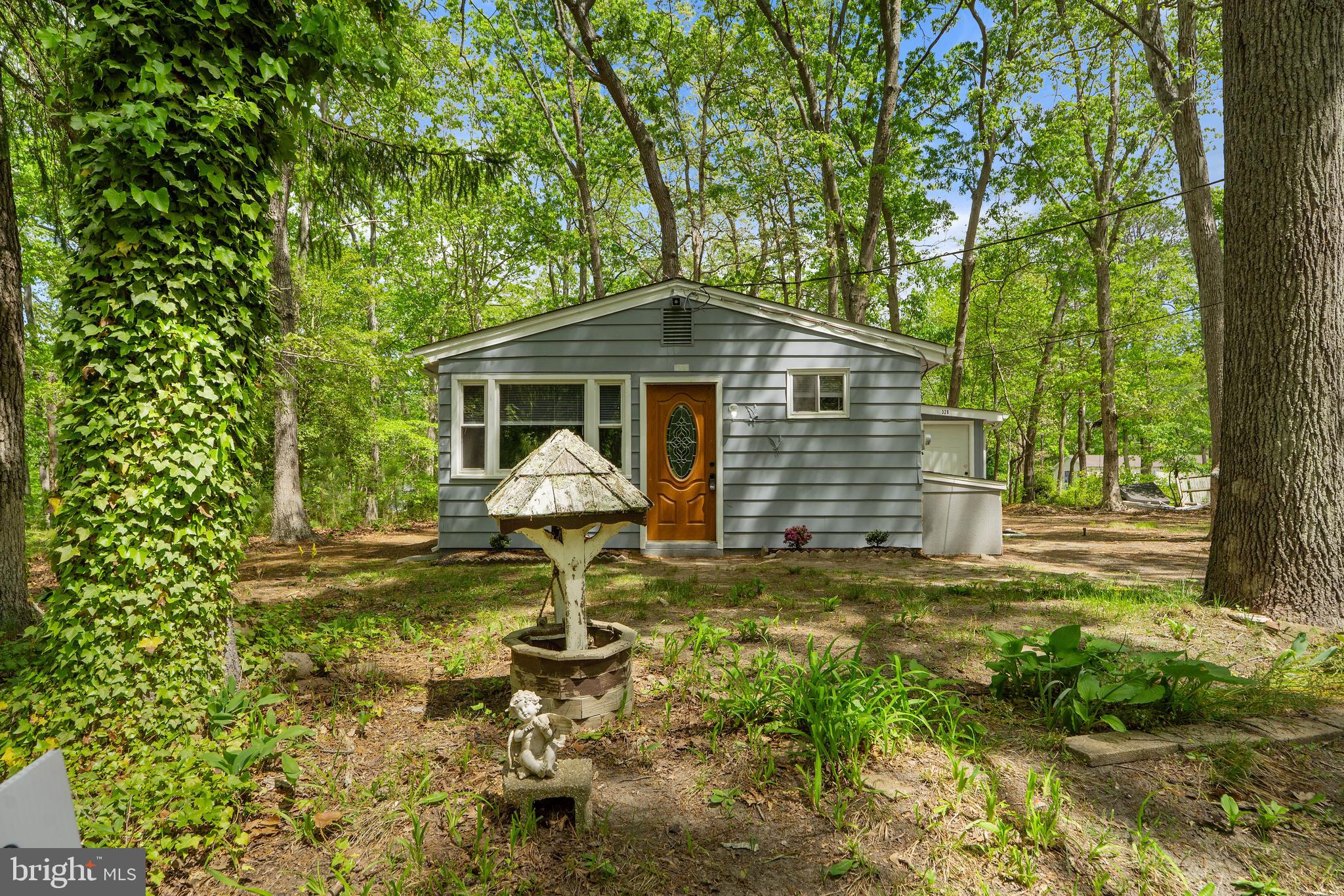 328 Jute Road Millville, NJ 08332 - Photo 2 of 28 a front view of a house with a yard