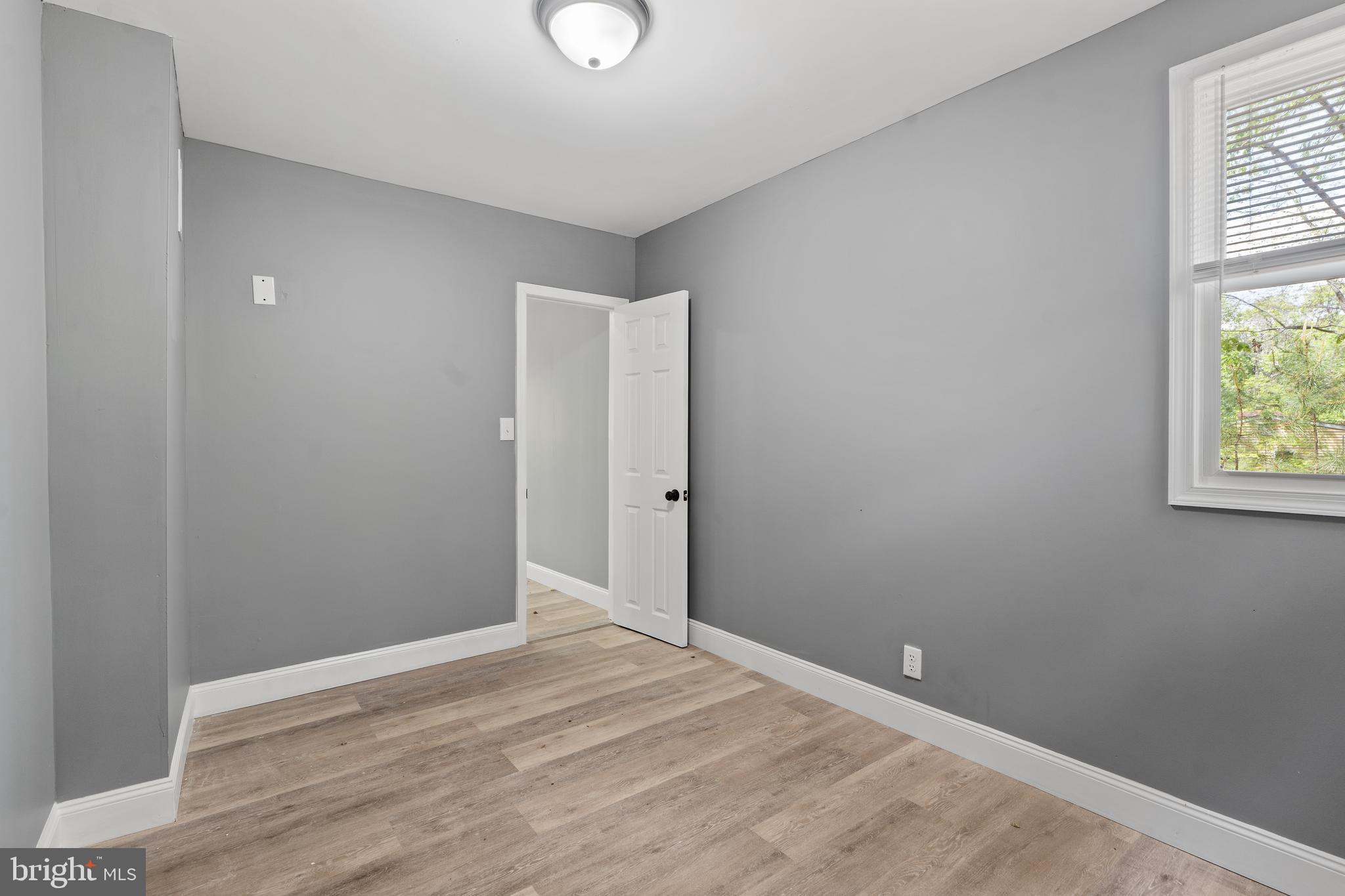 328 Jute Road Millville, NJ 08332 - Photo 22 of 28 an empty room with windows and closet