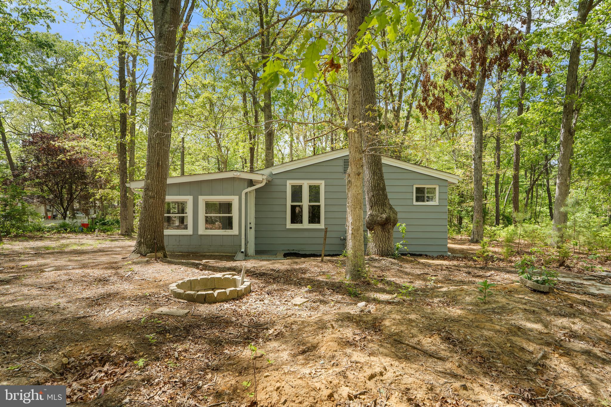 328 Jute Road Millville, NJ 08332 - Photo 26 of 28 a view of a house with a yard
