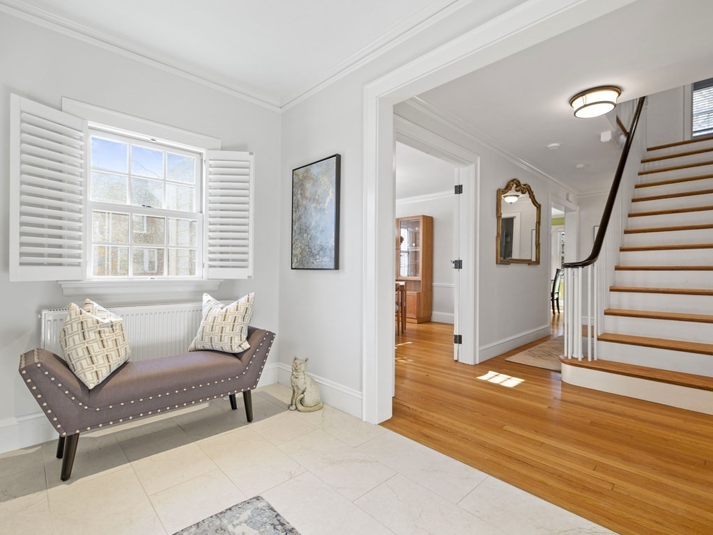 36 Summit Road Wellesley, MA 02482 - Photo 2 of 17 a living room with furniture and a wooden floor