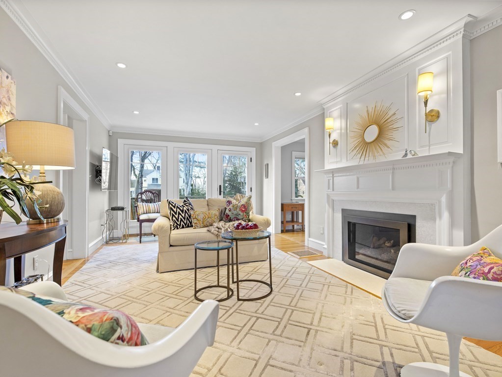 36 Summit Road Wellesley, MA 02482 - Photo 8 of 17 a living room with furniture a flat screen tv and a fireplace