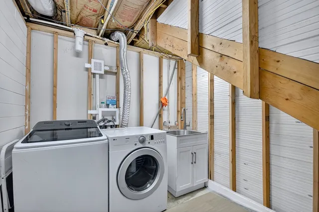 a utility room with dryer and washer