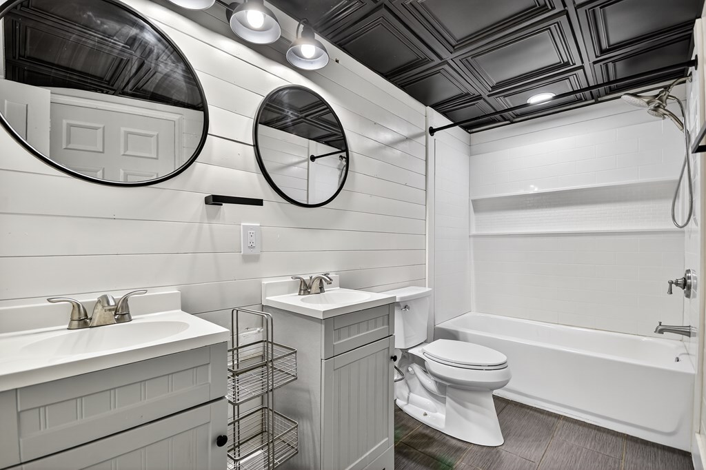 1146 Galloway Road Blue Ridge, GA 30513 - Photo 22 of 33 a bathroom with a toilet sink and mirror