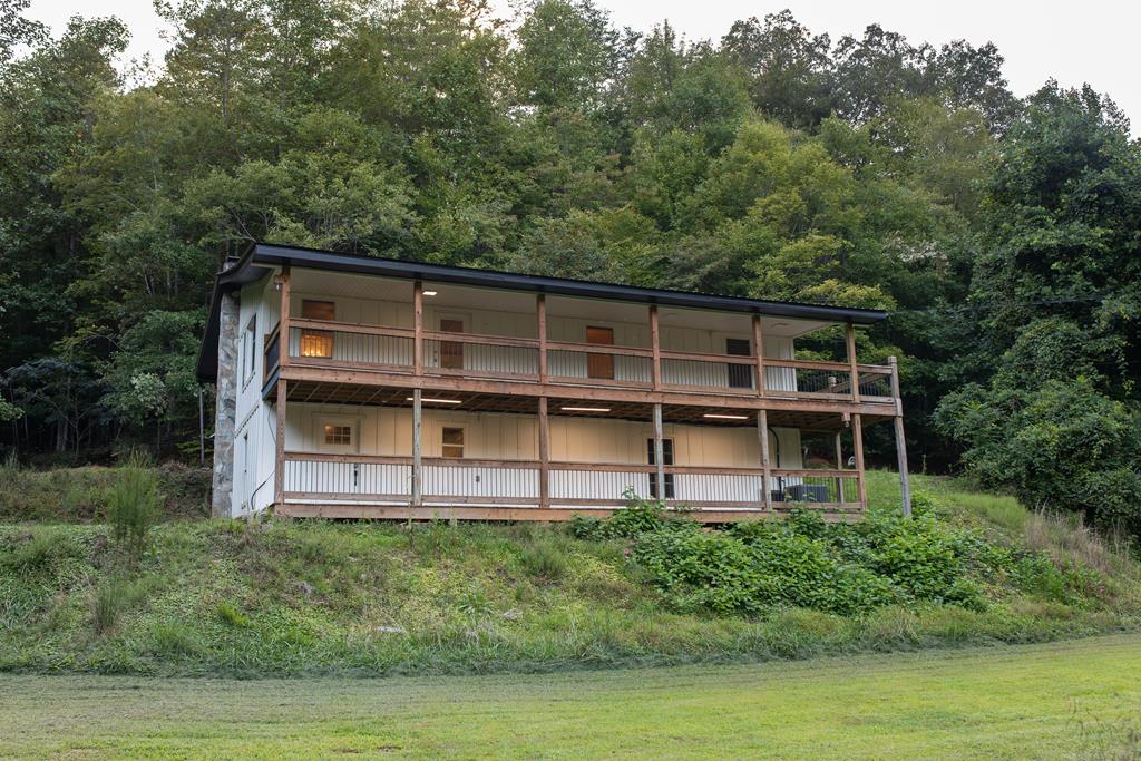 1146 Galloway Road Blue Ridge, GA 30513 - Photo 32 of 33 a view of a house with a yard