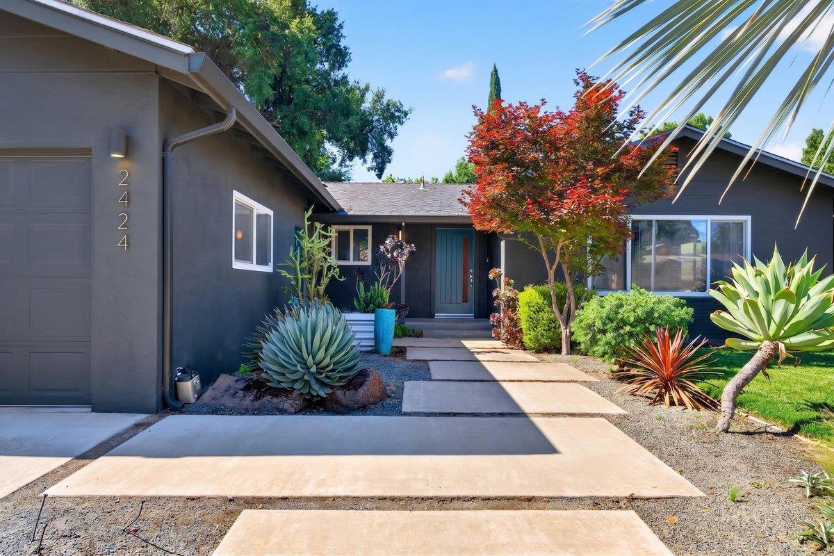 2424 Killarney Way Modesto, CA 95355 - Photo 3 of 30 a view of a house with a patio