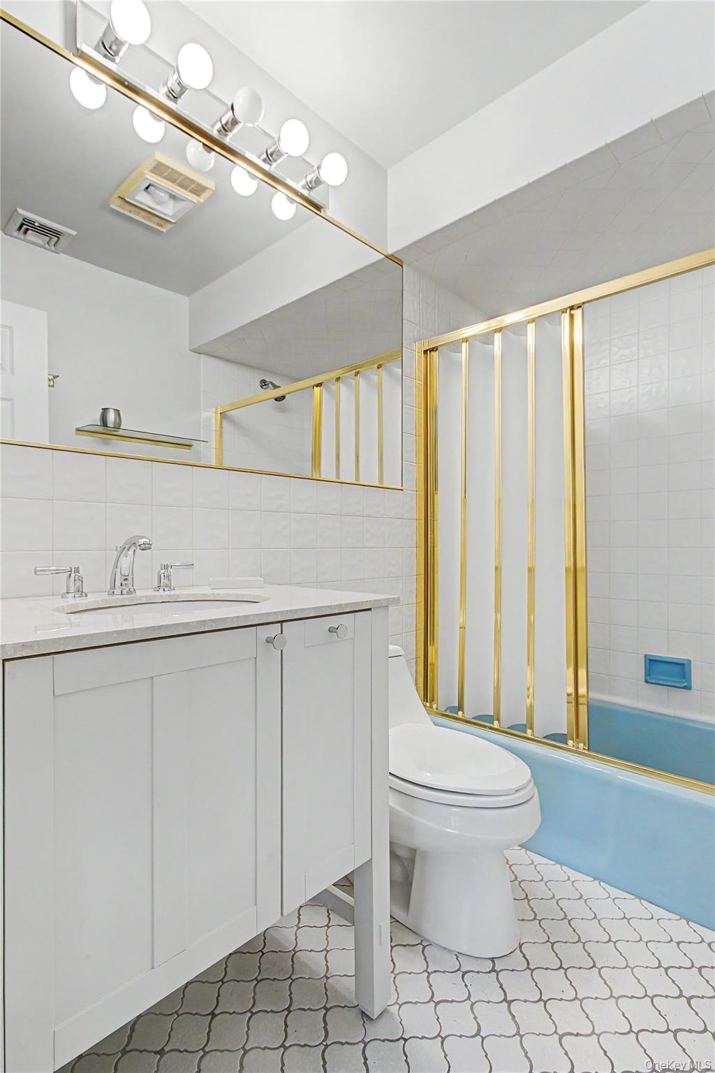 24 Richard Road Mahopac, NY 10541 - Photo 22 of 47 a bathroom with a sink a toilet and shower