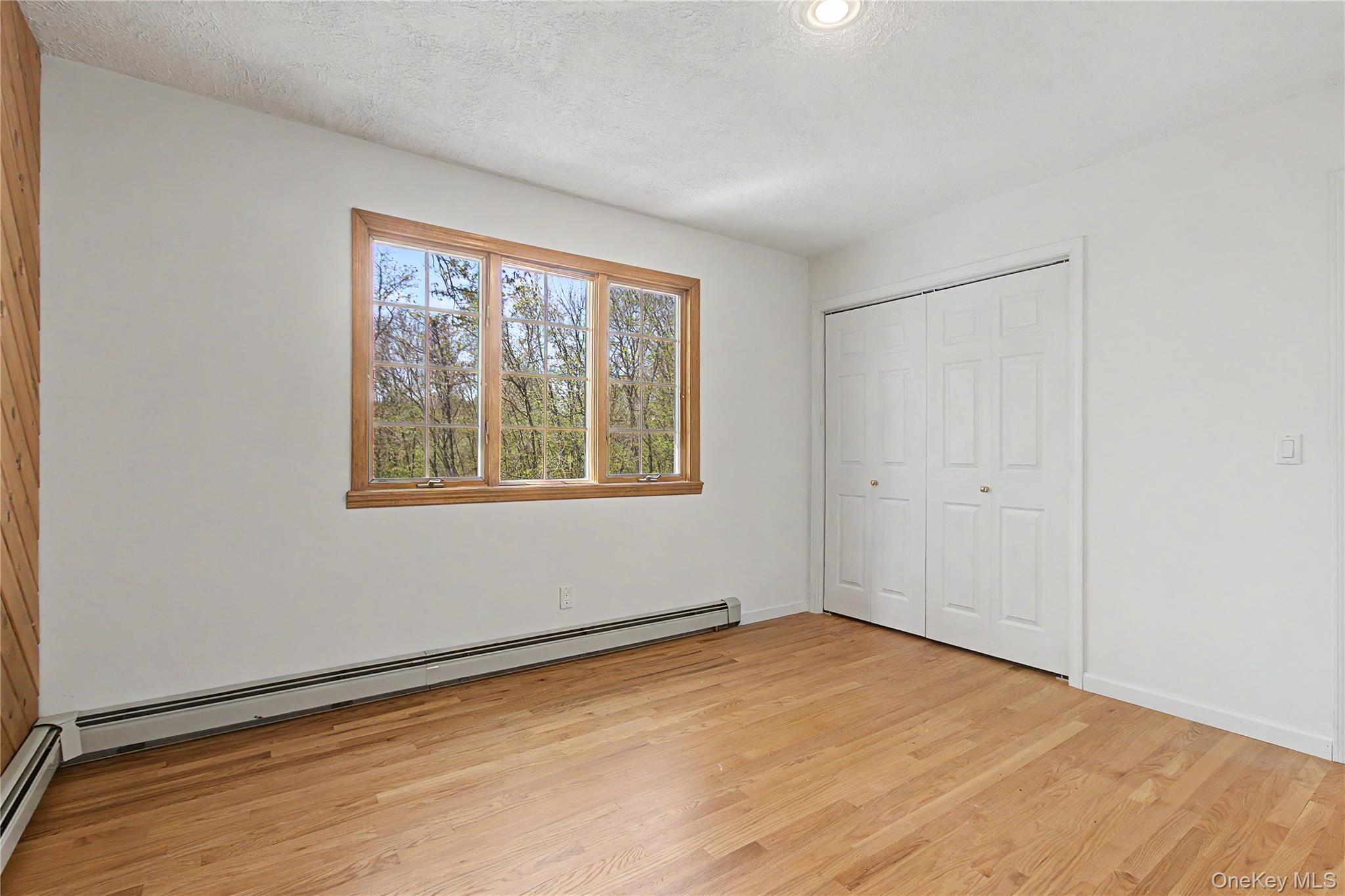 24 Richard Road Mahopac, NY 10541 - Photo 26 of 47 a view of an empty room with a window
