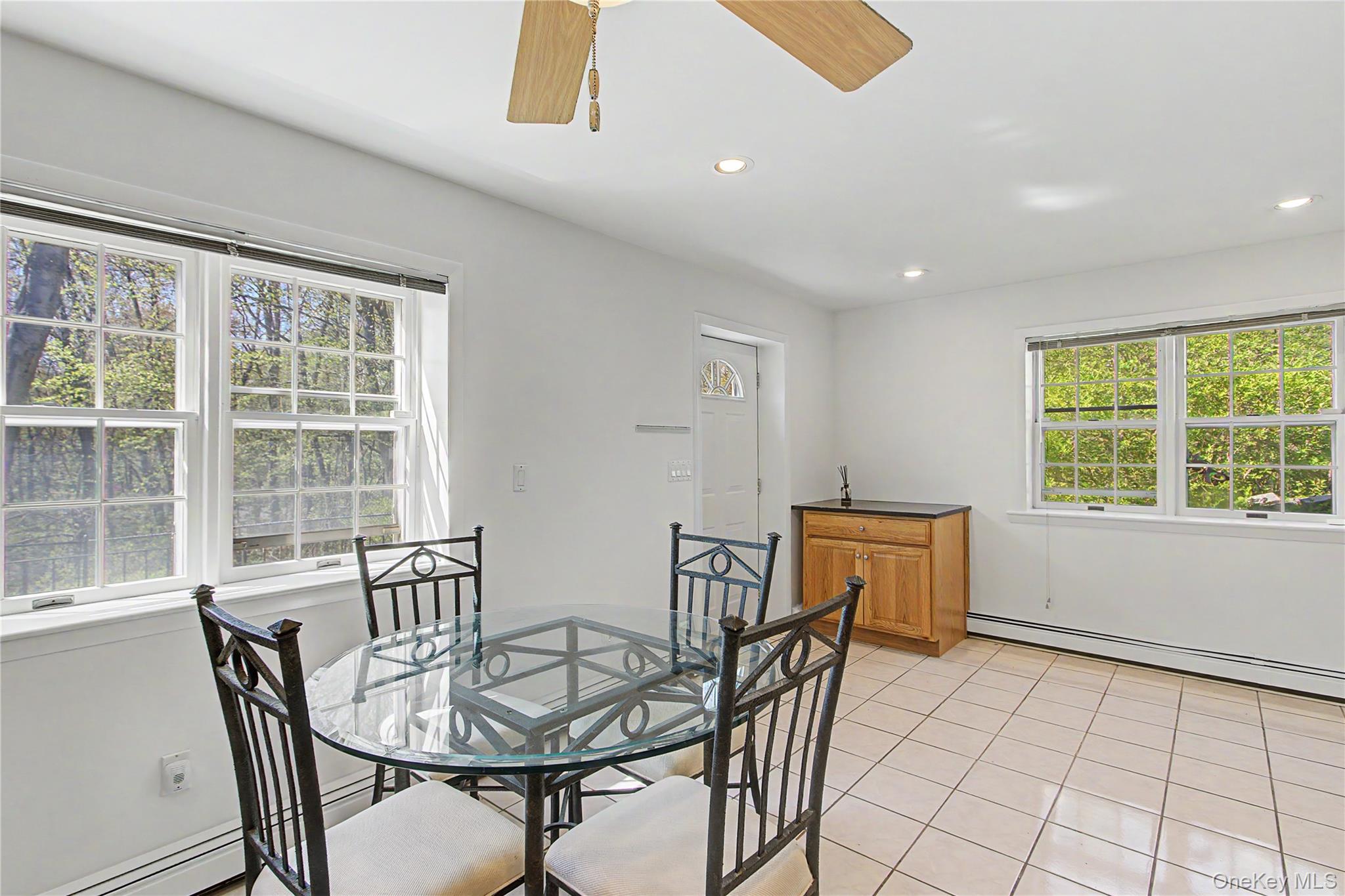 24 Richard Road Mahopac, NY 10541 - Photo 34 of 47 a view of a dining room with furniture and windows