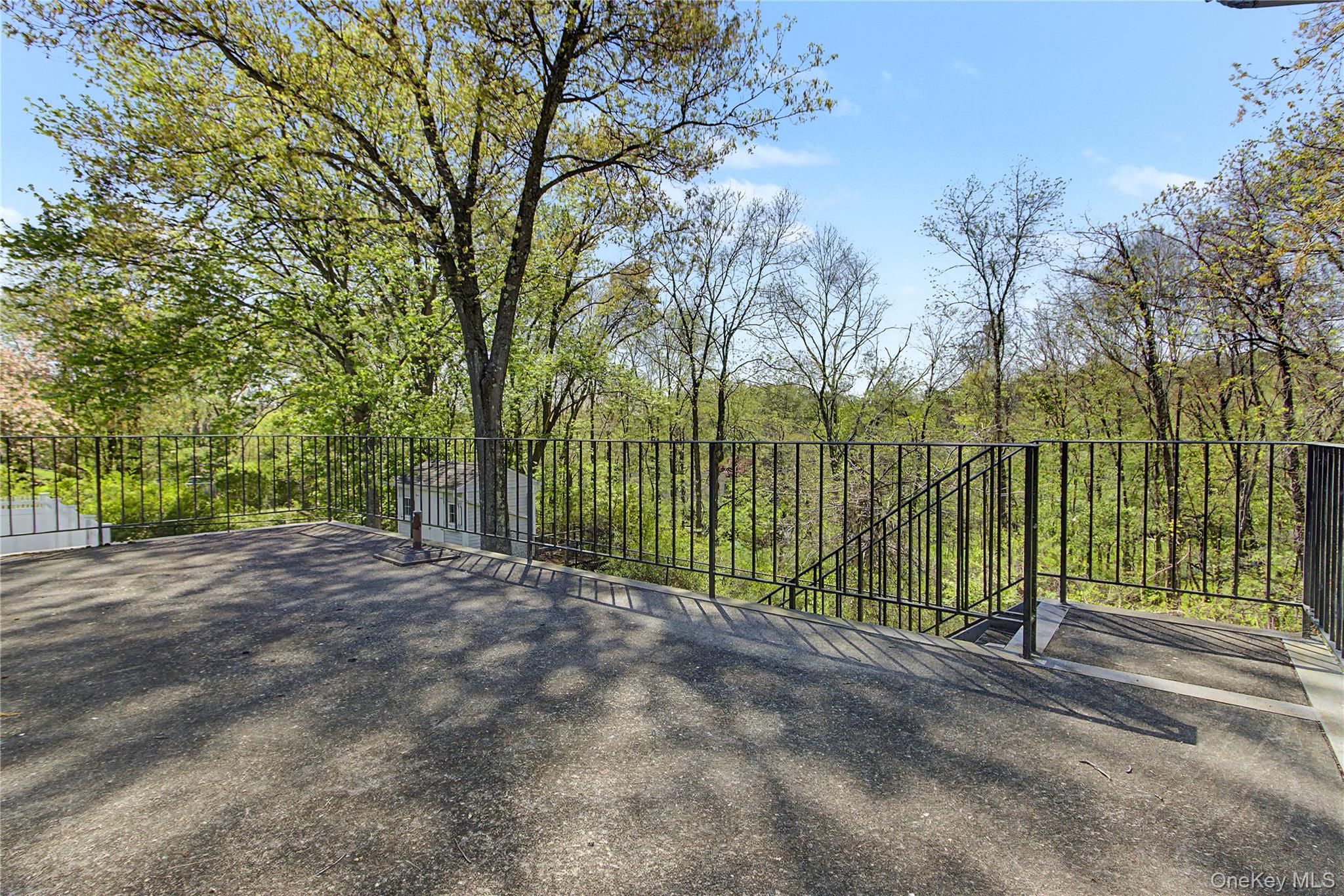 24 Richard Road Mahopac, NY 10541 - Photo 37 of 47 a view of a street with large trees