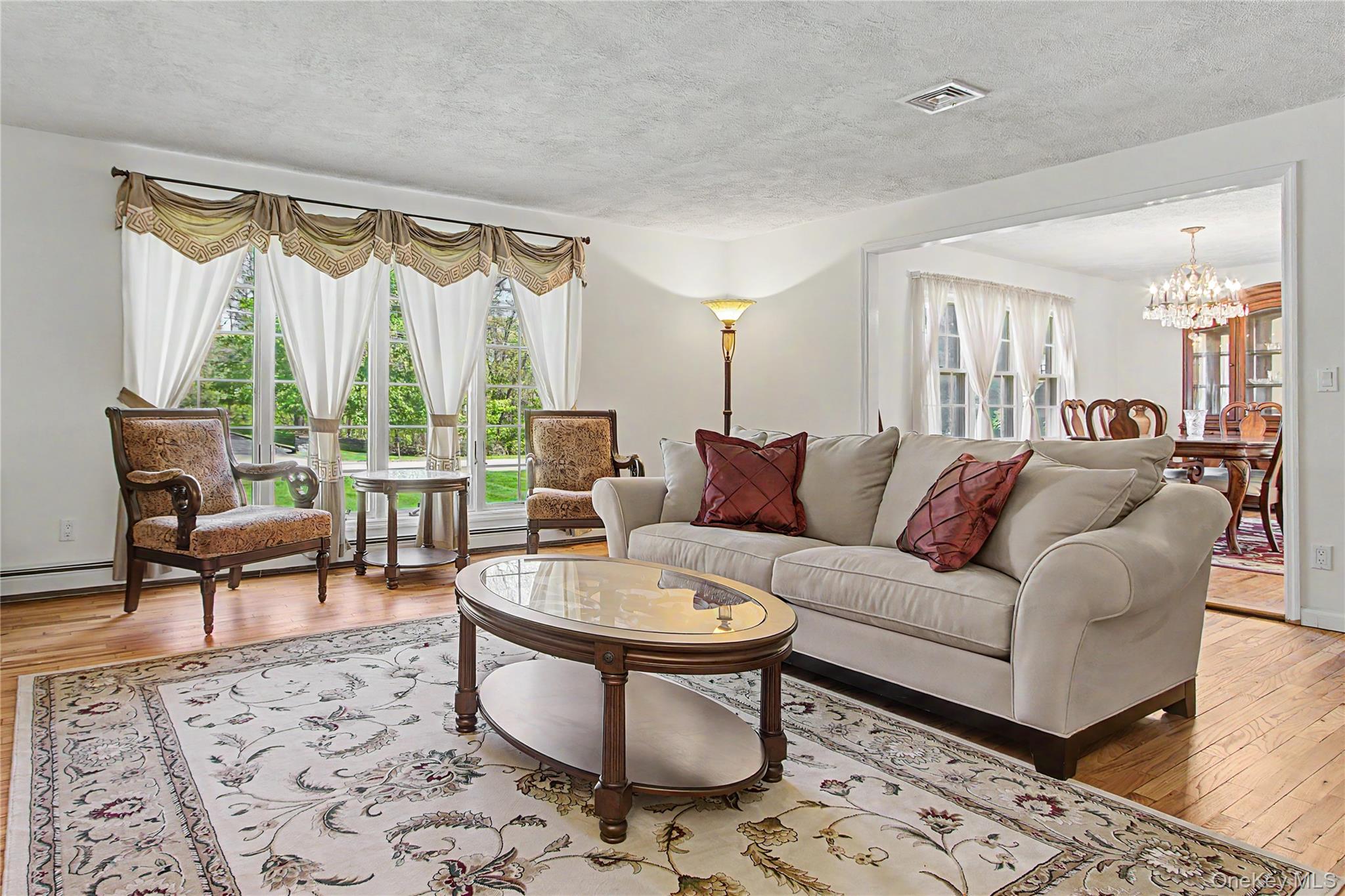 24 Richard Road Mahopac, NY 10541 - Photo 5 of 47 a living room with furniture and a large window
