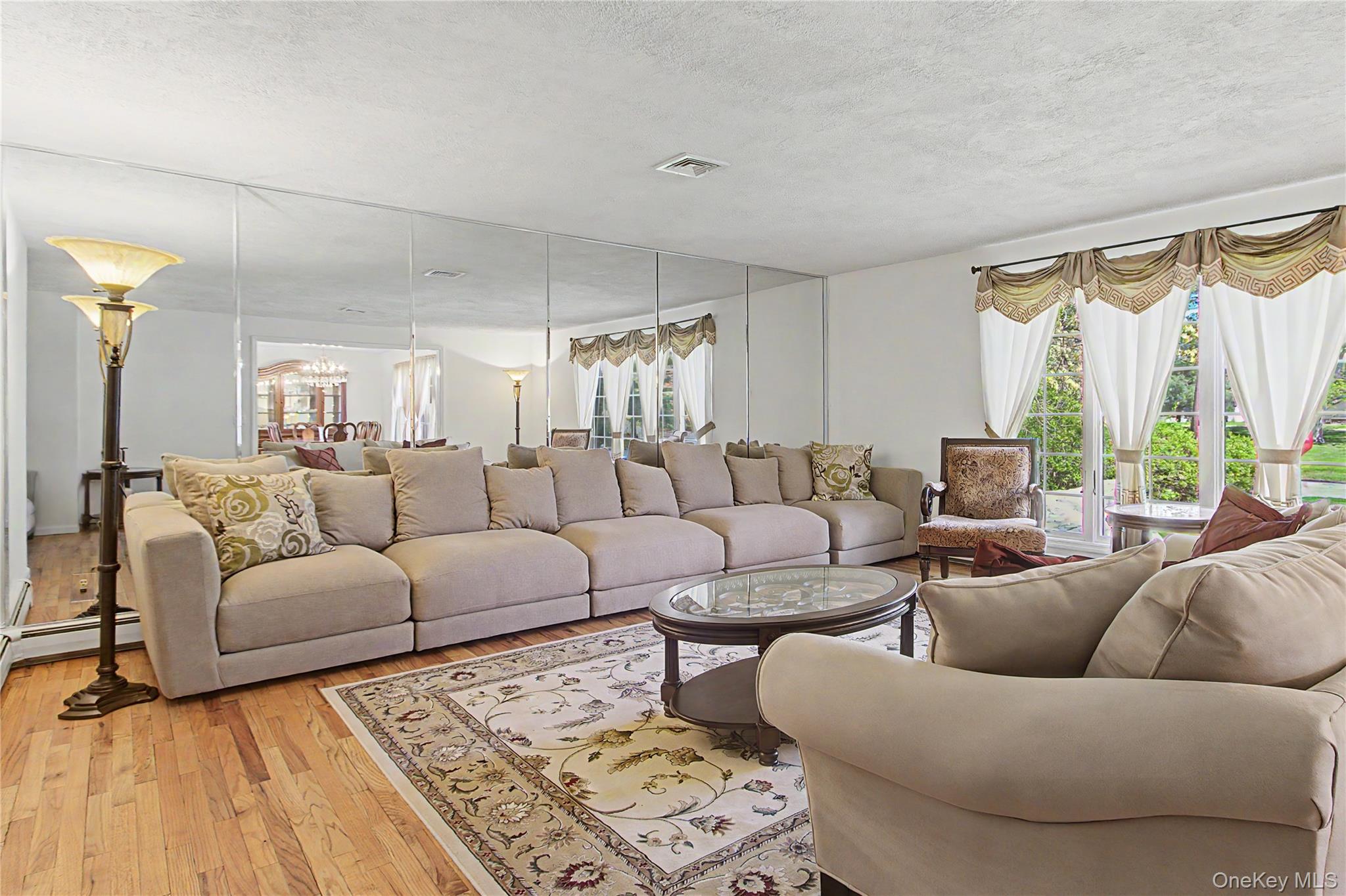 24 Richard Road Mahopac, NY 10541 - Photo 6 of 47 a living room with furniture and a large window