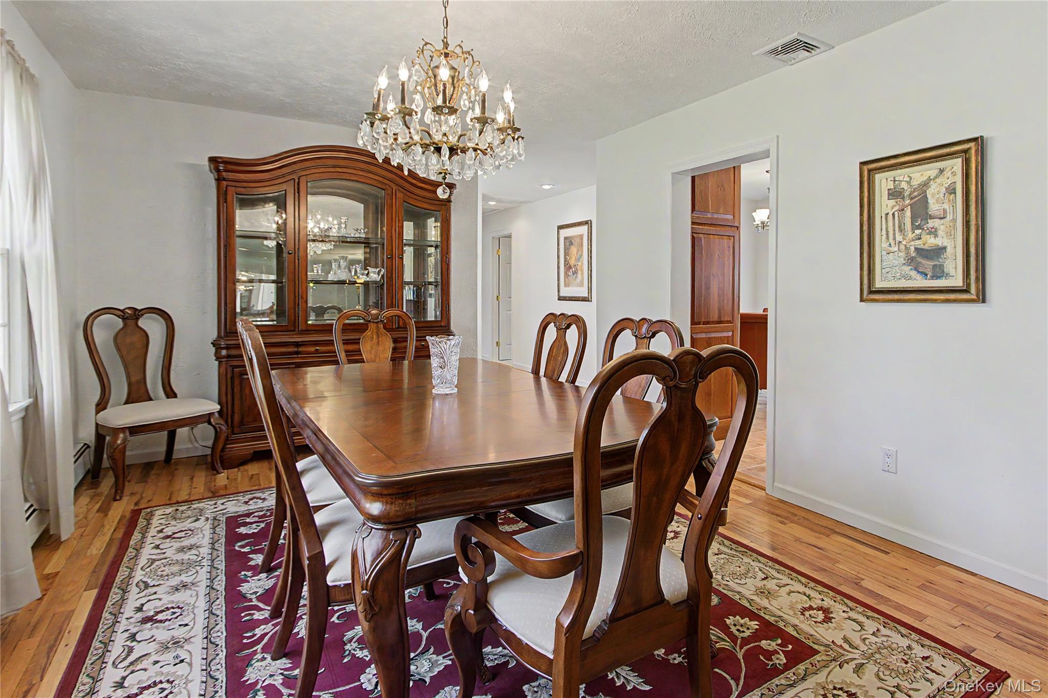 24 Richard Road Mahopac, NY 10541 - Photo 10 of 47 a dining room with furniture and chandelier