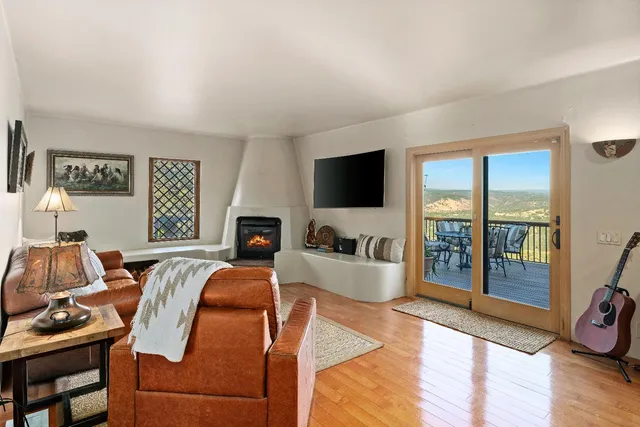a kitchen with granite countertop a sink and a stove top oven
