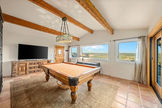 a outdoor space with patio the couches and dining table with chairs