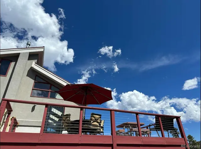 a view of balcony with furniture