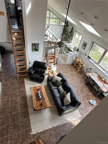 a room with furniture and a book shelf