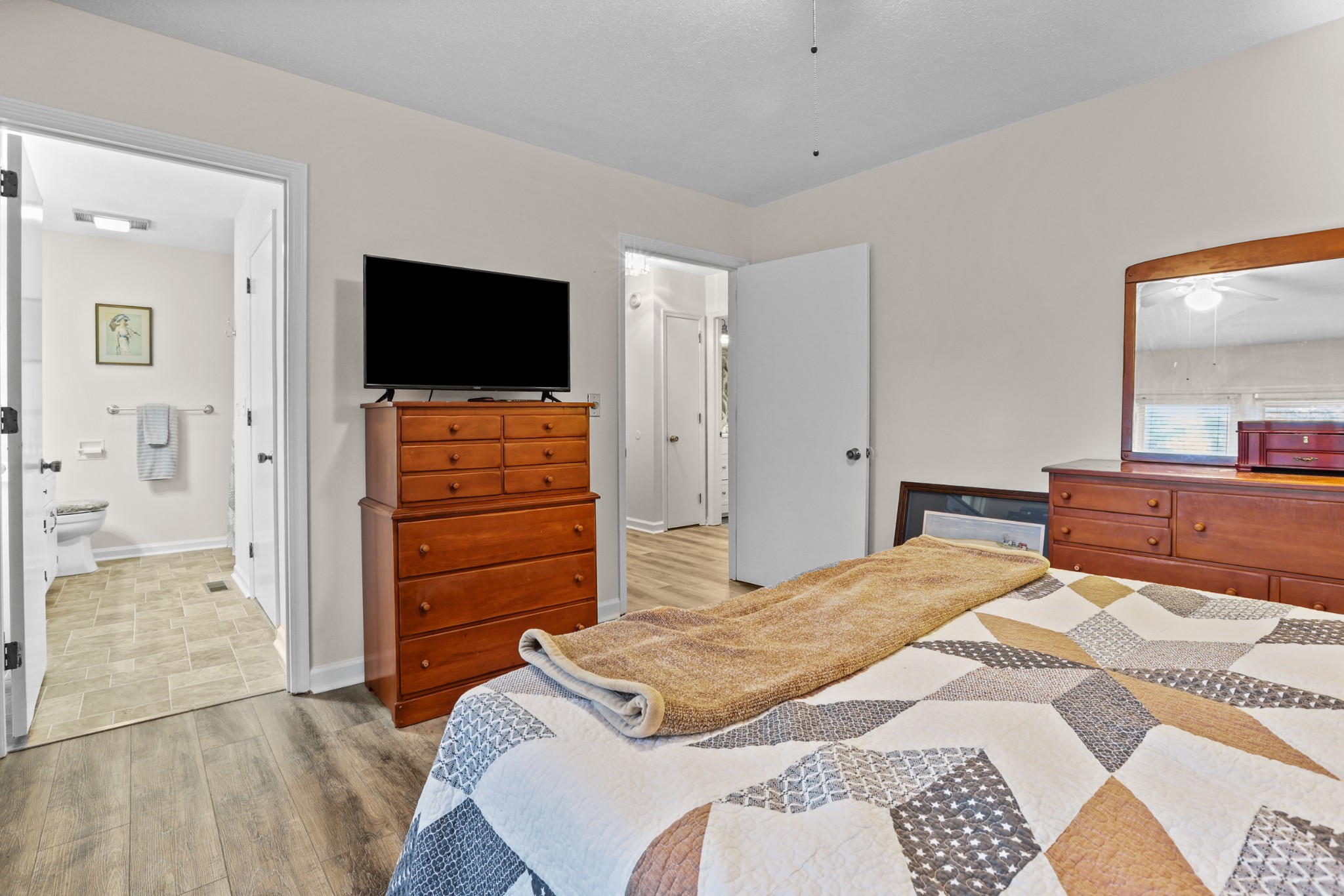 236 Old Columbia Road Dickson, TN 37055 - Photo 17 of 26 a bedroom with a bed and a television