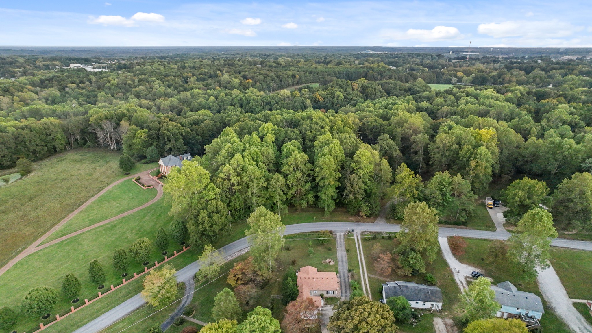236 Old Columbia Road Dickson, TN 37055 - Photo 25 of 26 an aerial view of residential houses with outdoor space and street view