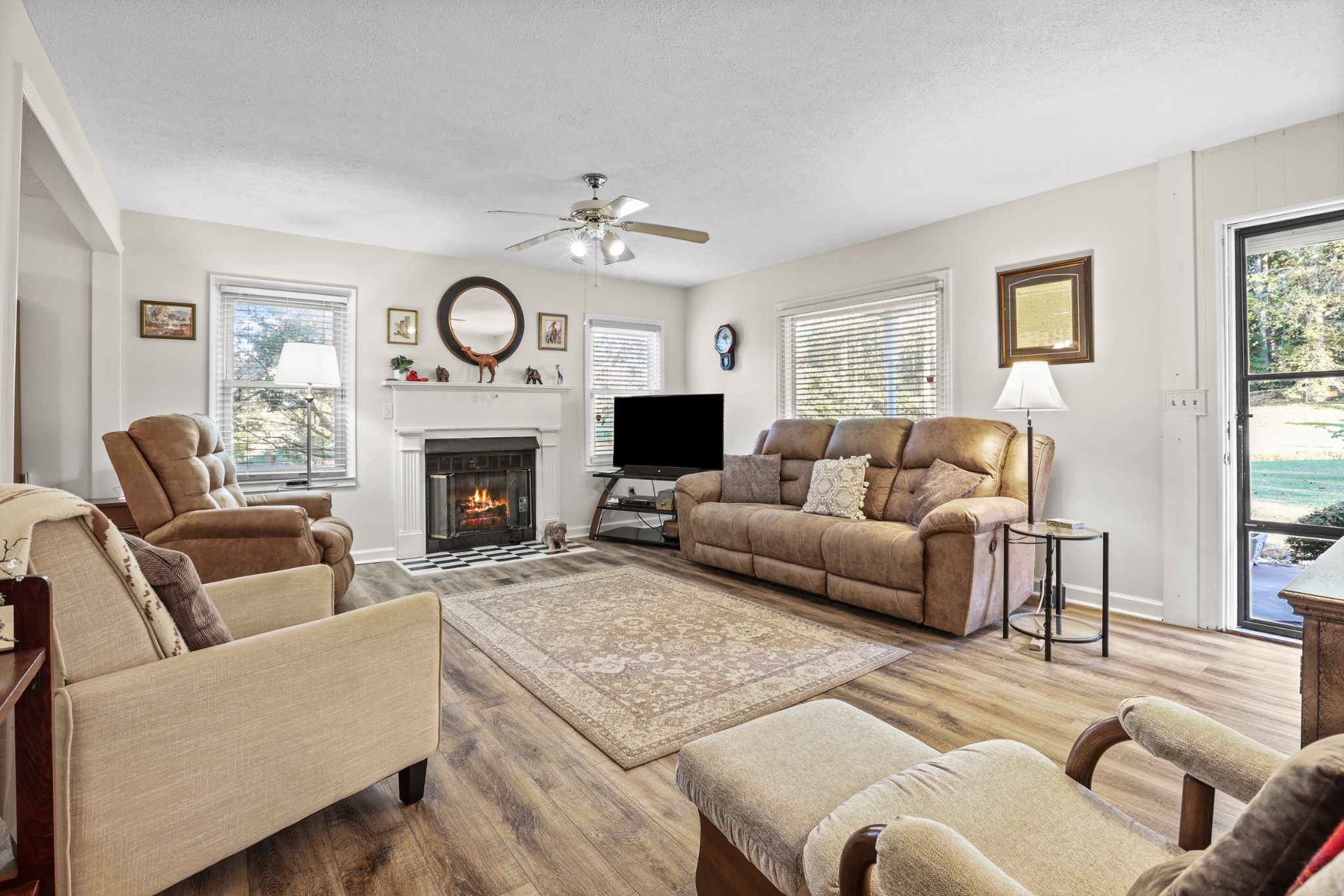 236 Old Columbia Road Dickson, TN 37055 - Photo 4 of 26 a living room with furniture fireplace and a large window